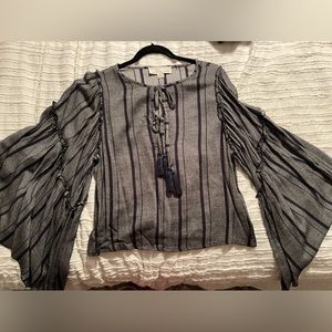 Long sleeve flared sleeve blouse